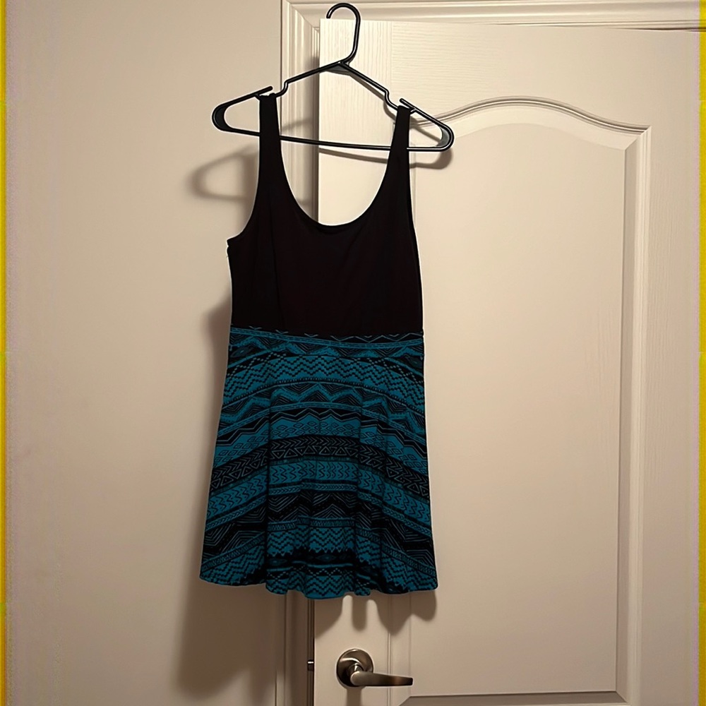 Nice summer dress . You can also use it with tights as a shirt